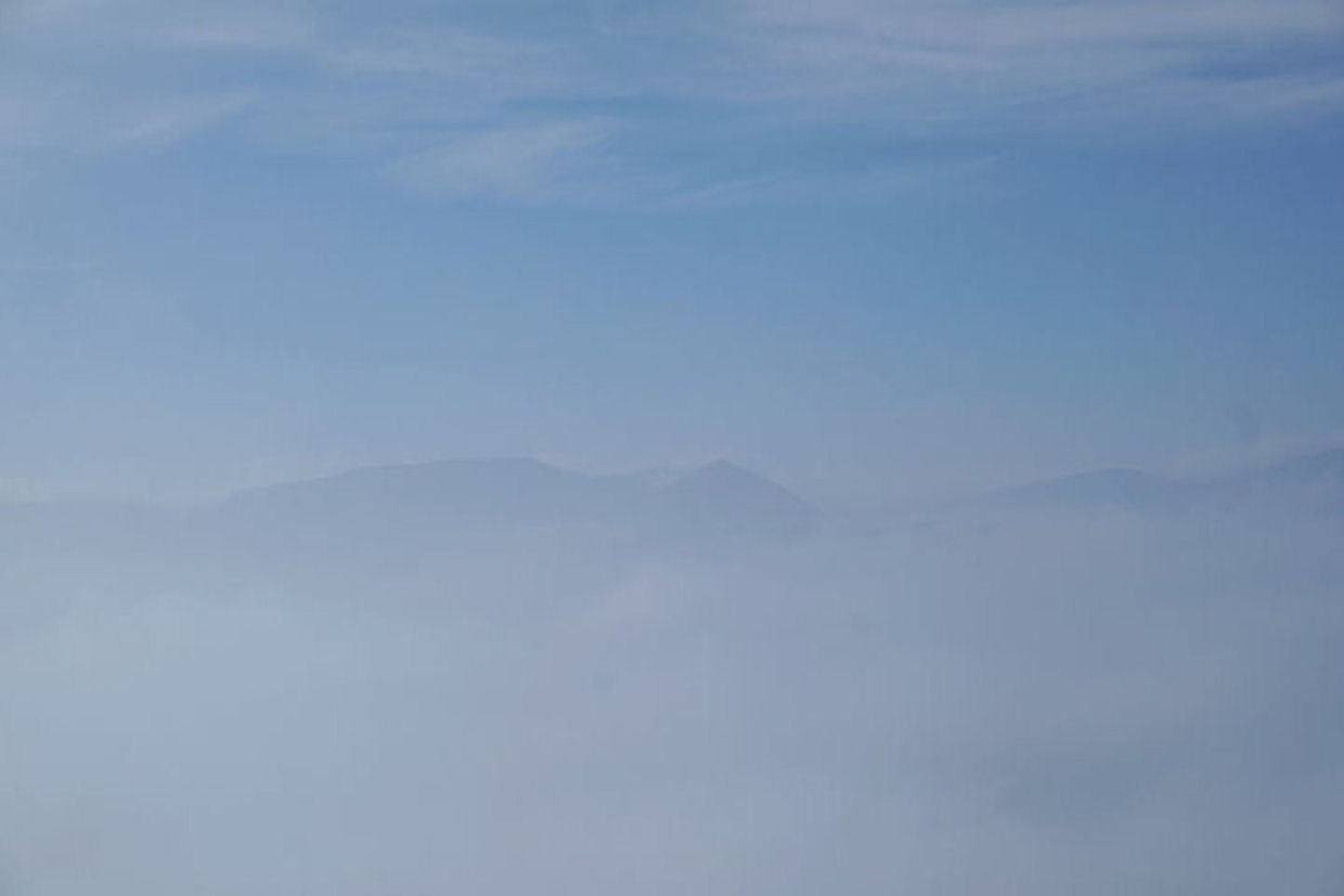 Helvellyn range on a bed of mist. Photo by Ian Mateer